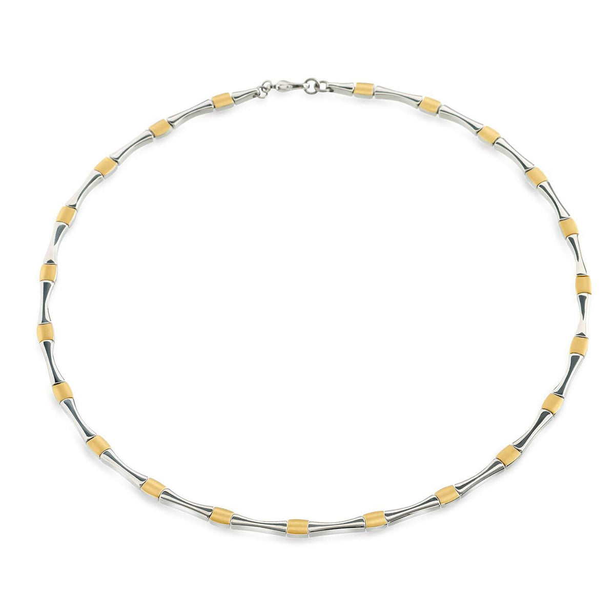 Collar bicolor de titanio con eslabones plateados y detalles dorados.