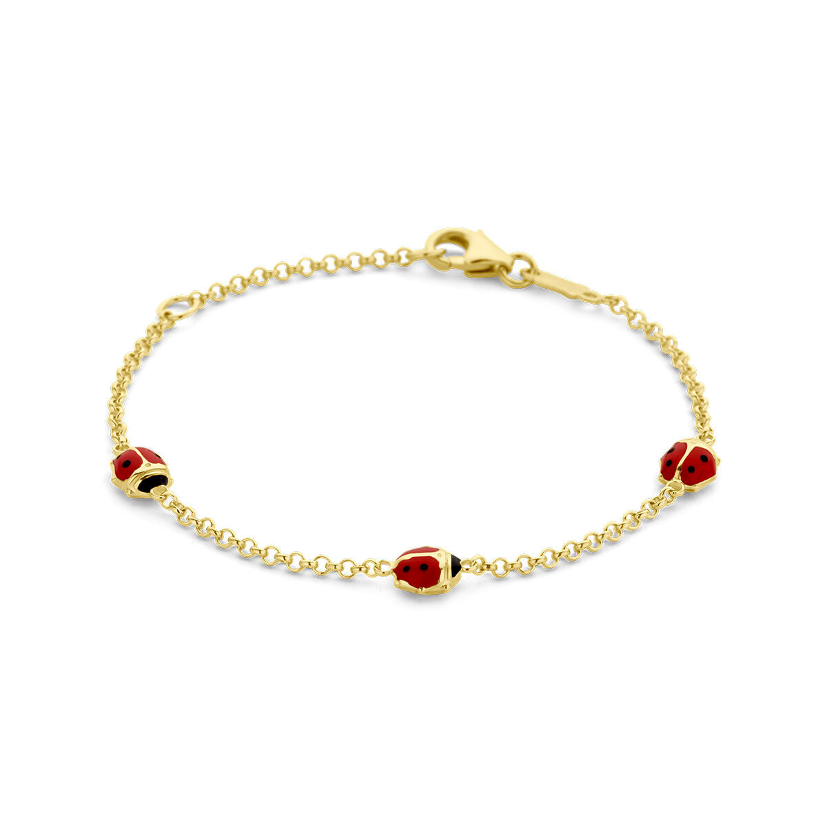 Pulsera de 14K en oro amarillo con tres charms de mariquita rojos.