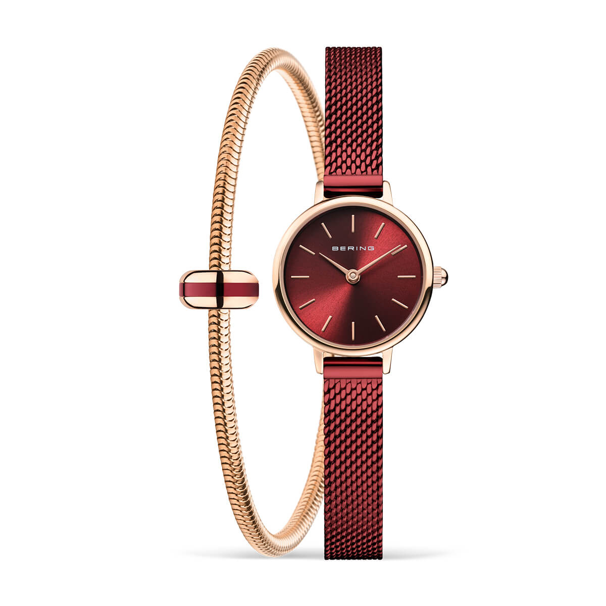 Reloj con esfera roja, correa de malla dorada y pulsera de metal trenzado.