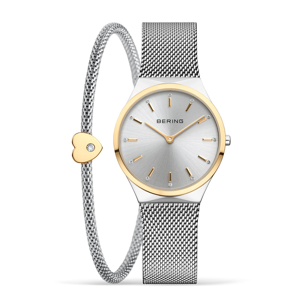 Reloj de mujer con esfera plateada, correa de malla metálica y detalles dorados.