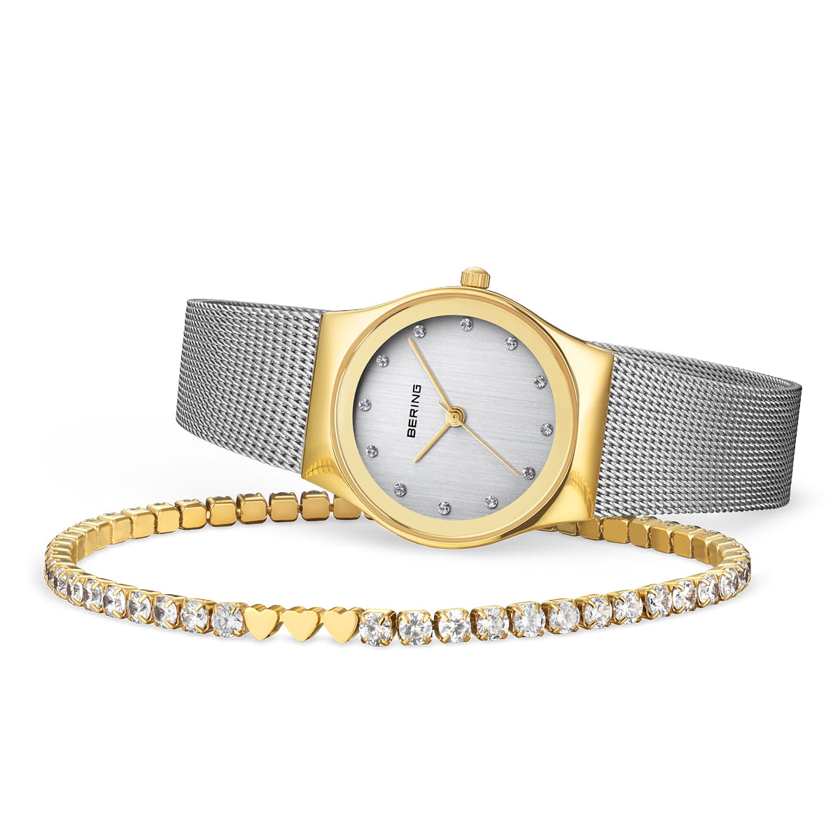 Het Bering 12927-001-GWP horloge, met een roestvrijstalen kast en roestvrijstalen mesh band, combineert prachtig met een gouden armband met kleine fonkelende steentjes en hartvormen. De zilveren wijzerplaat, uitgerust met Quartz-uurwerk en minimalistische uurmarkeringen, maakt dit elegante duo compleet.