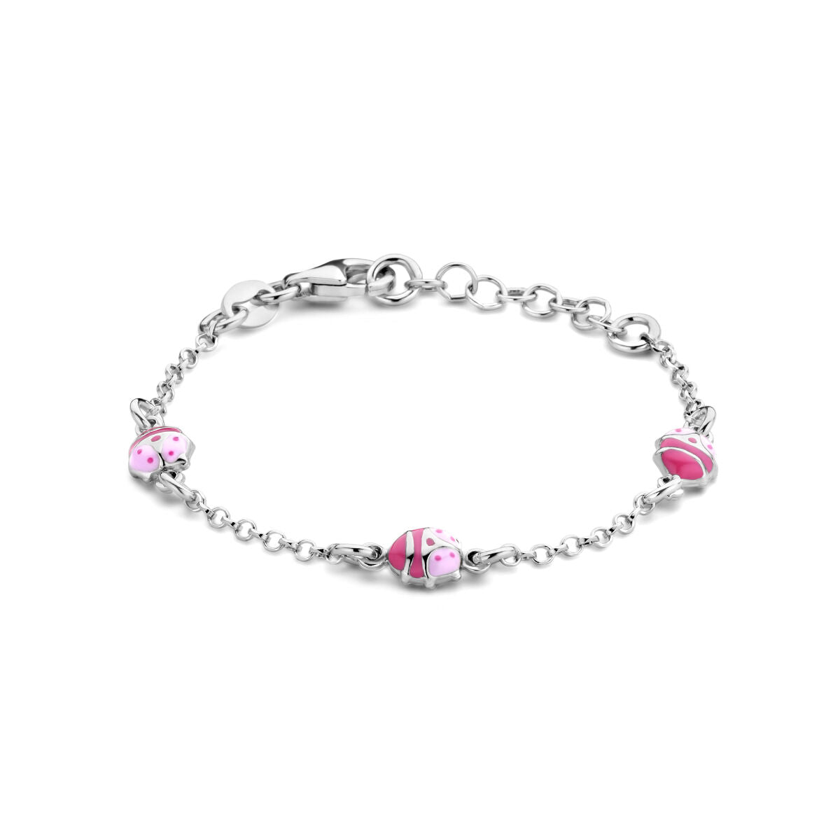 Pulsera de plata rodiada con tres charms de mariquita en tonos rosa y blanco.