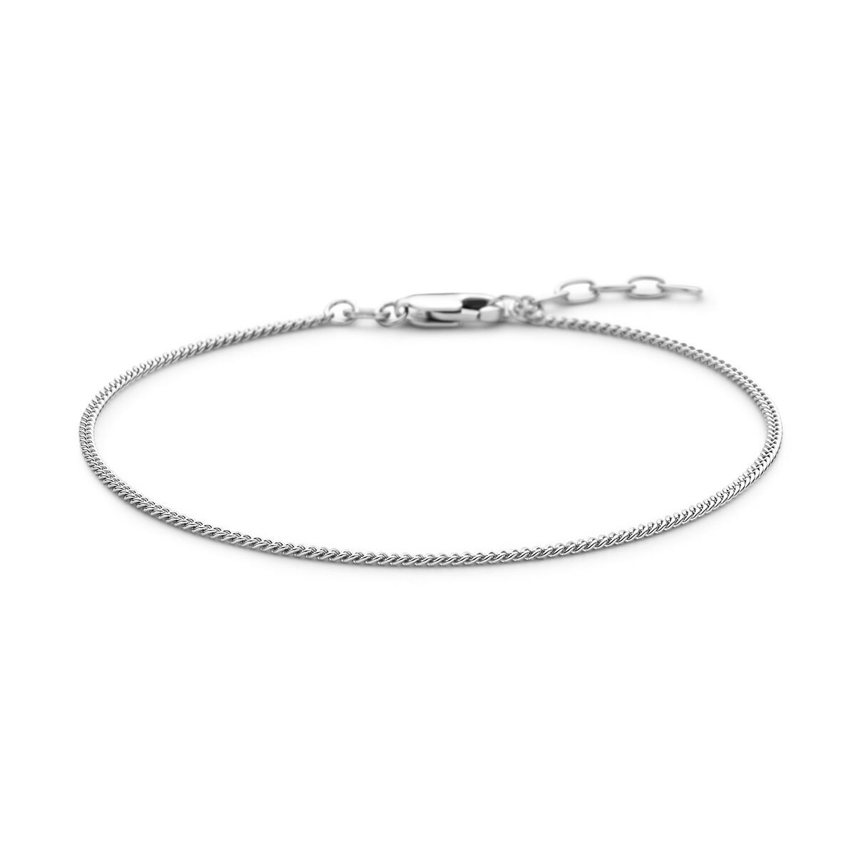 Pulsera gourmette de 4 lados pulidos de 1,4 mm, en plata rodiada, con extensión de 19 + 2 cm.