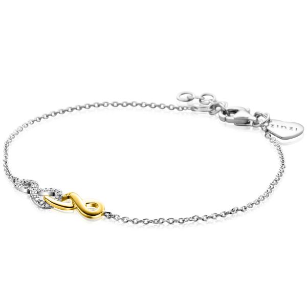 Pulsera de plata con un símbolo de infinito dorado y detalles brillantes.