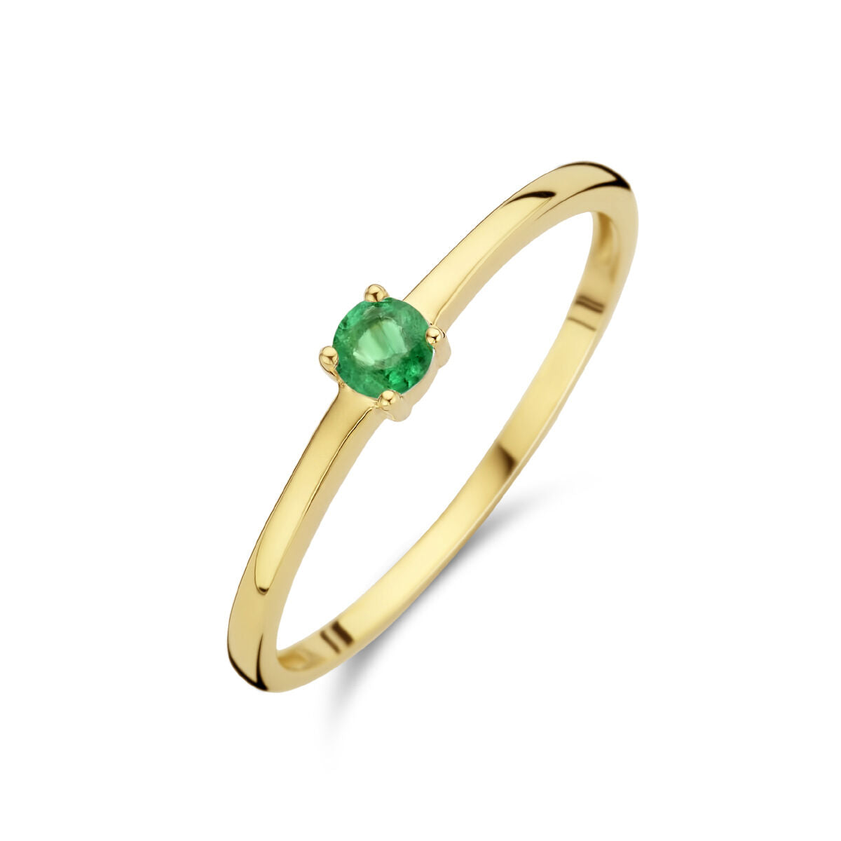 Anillo de oro amarillo de 14 quilates con una piedra preciosa esmeralda verde.