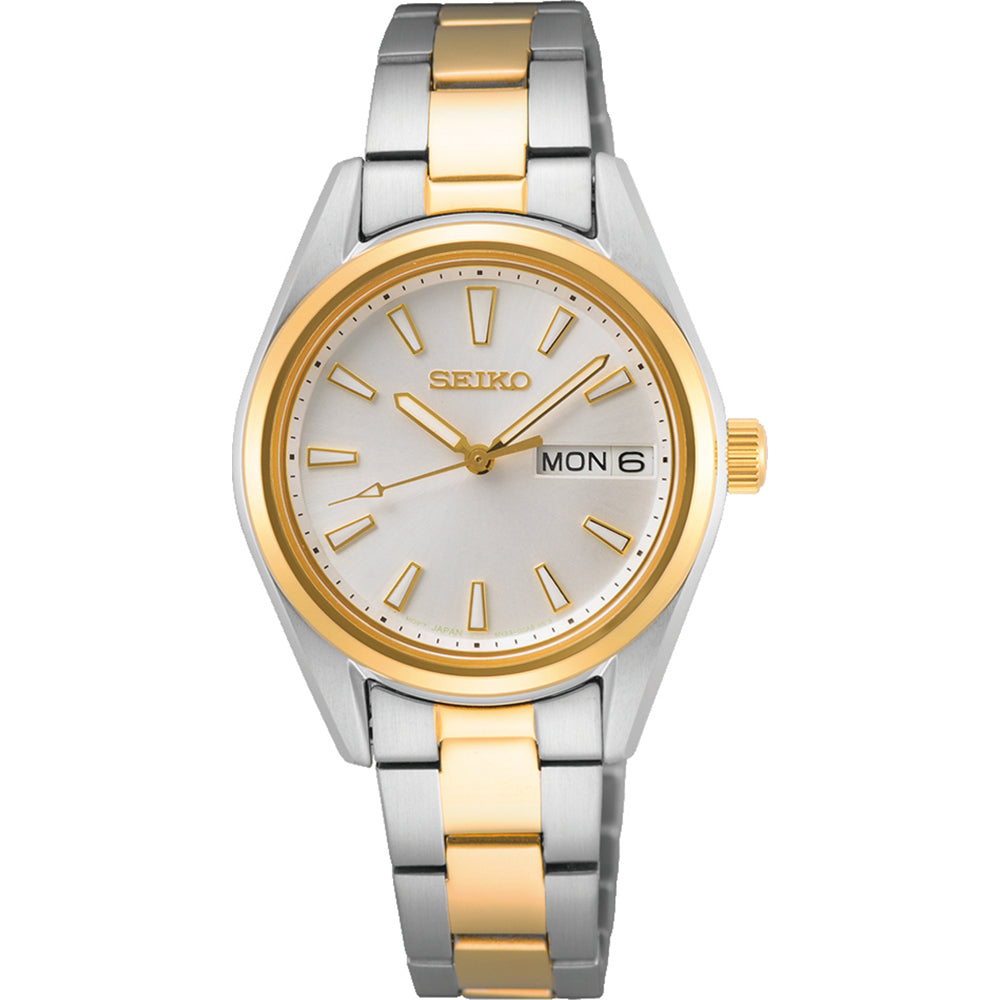 Reloj de señora Seiko con esfera plateada, caja dorada y plateada, y correa de acero inoxidable.