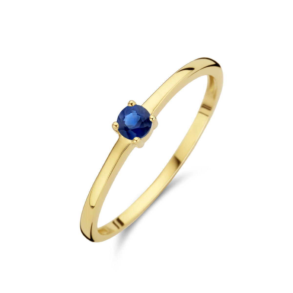 Anillo de oro amarillo de 14K con una piedra de nacimiento de zafiro azul.