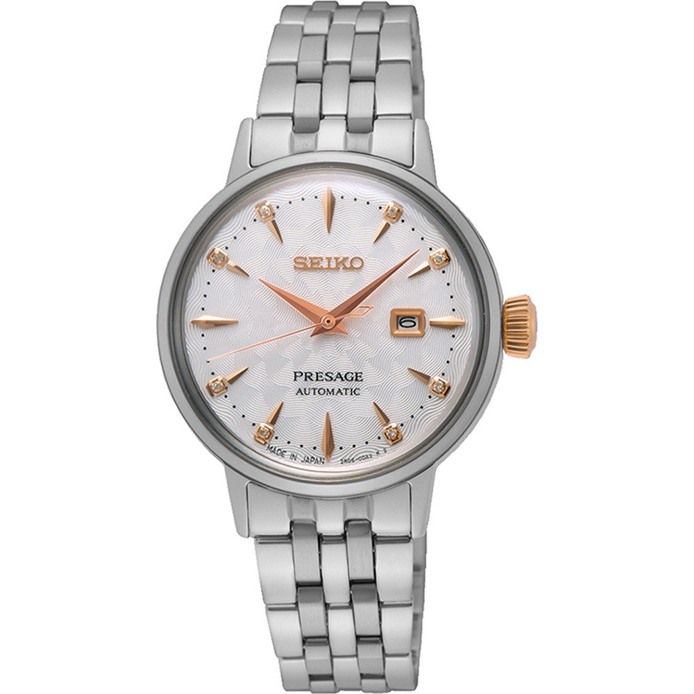 Reloj de mujer Seiko Presage con esfera plateada, detalles en oro rosado y correa de acero inoxidable.