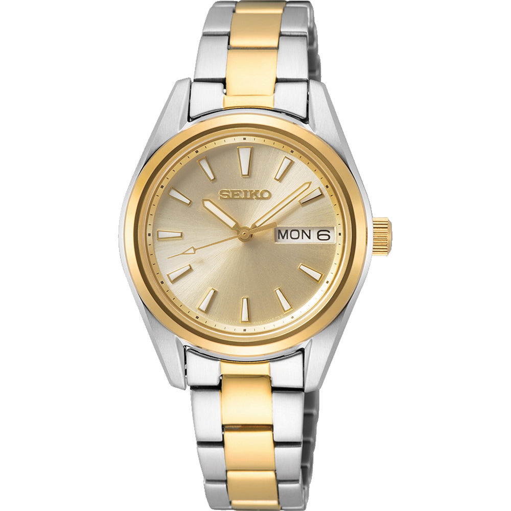 Reloj de dama Seiko con caja y pulsera de acero inoxidable bicolor, esfera dorada y detalles en plata.