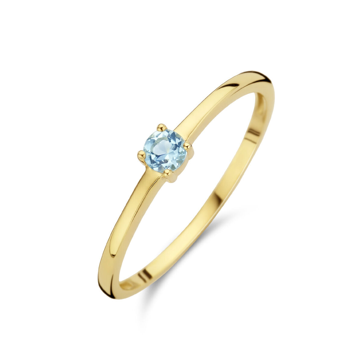 Anillo de oro amarillo de 14K con una piedra de nacimiento de aguamarina.