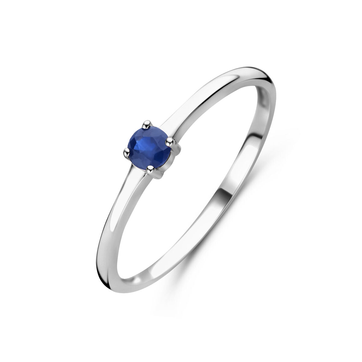 Anillo de plata rodiada con una piedra de nacimiento de zafiro azul.