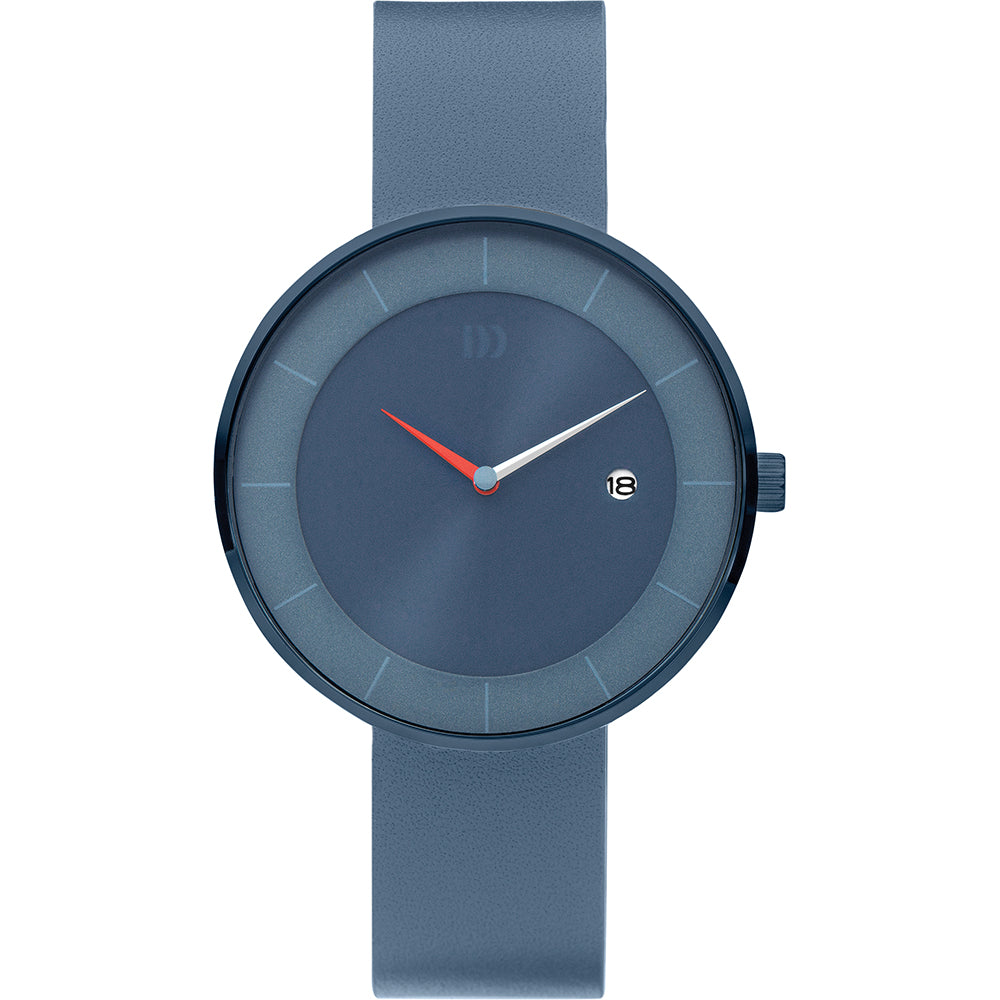 Reloj de esfera azul con correa de silicona, manecillas rojas y detalles minimalistas.