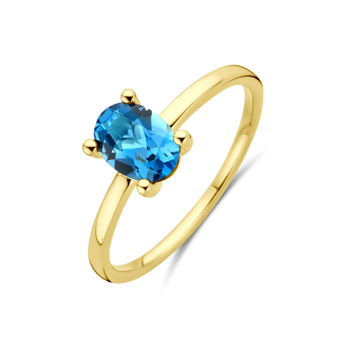 Anillo de oro amarillo de 14K con topacio london blue ovalado.