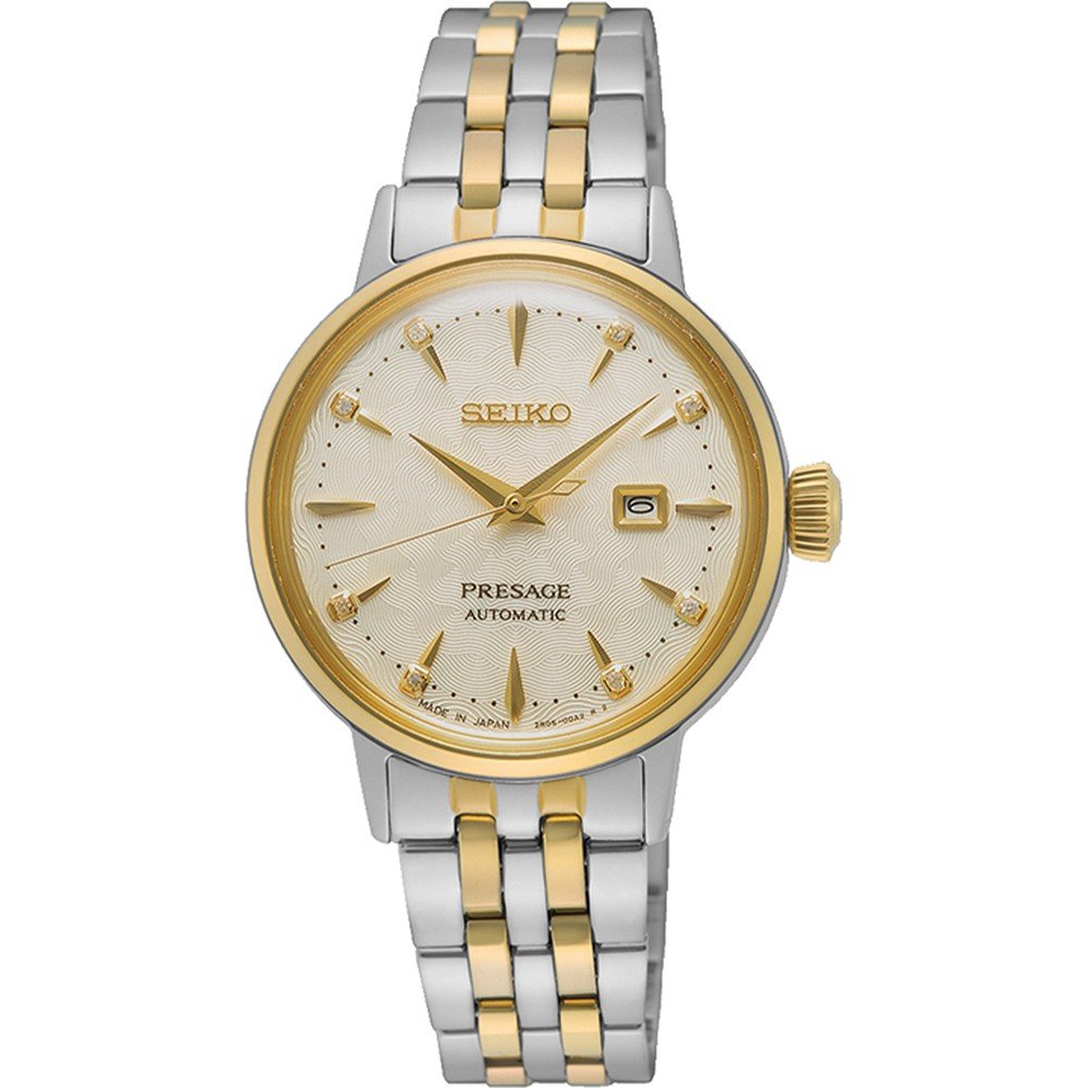 Reloj de dama Seiko Presage con caja plateada y dorada, esfera dorada y correa de acero inoxidable.