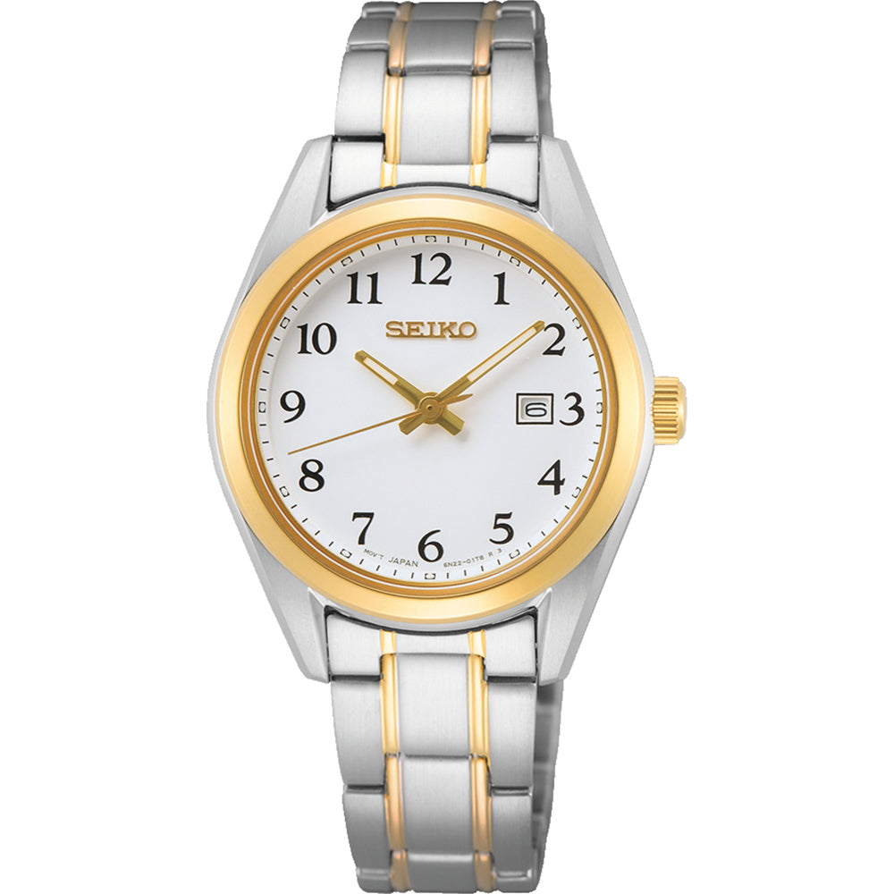 Reloj de mujer Seiko con esfera blanca, caja plateada y dorada, y pulsera de acero inoxidable.