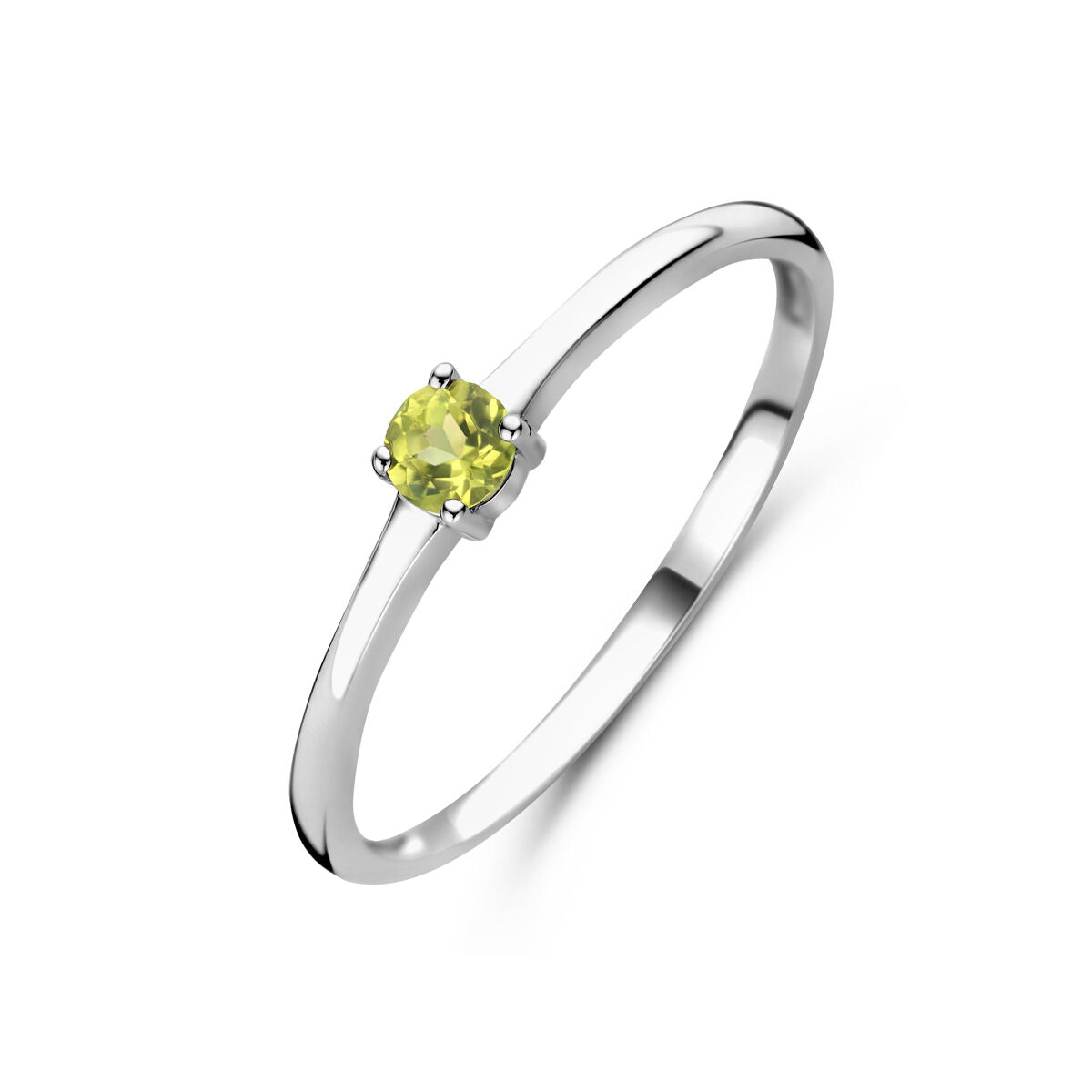 Anillo de plata rodiada con una piedra de nacimiento peridoto de color verde amarillento.