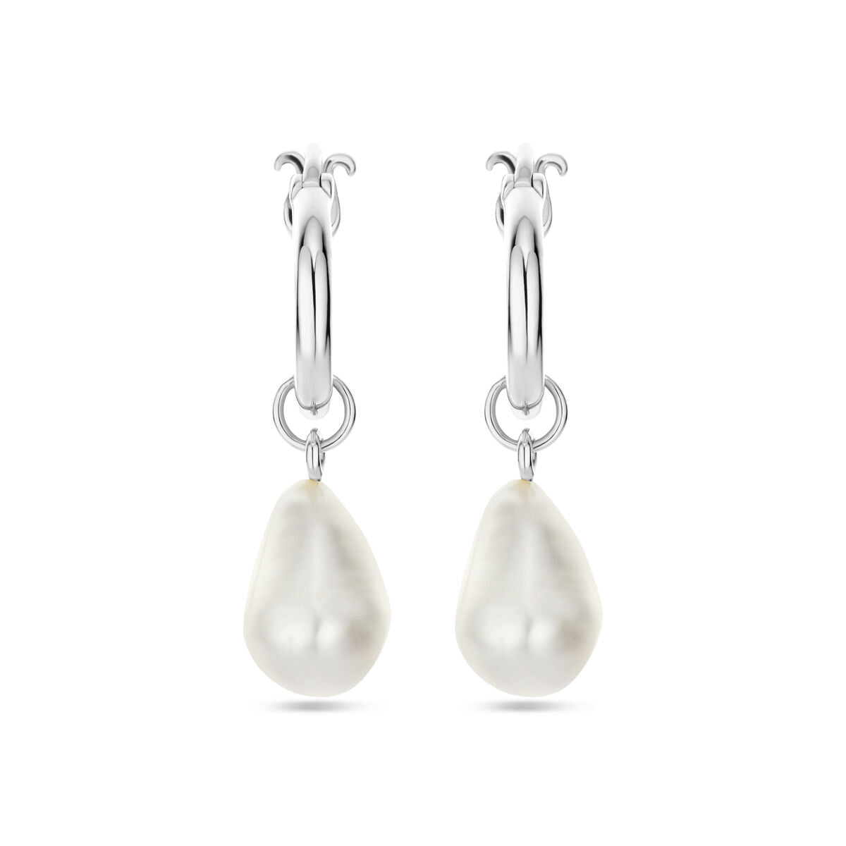 Pendientes largos de perla barroca de 32 mm en plata rodiada.