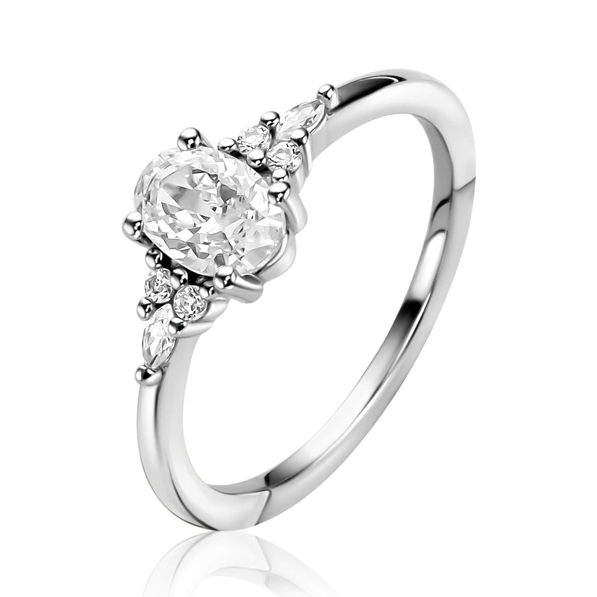 Anillo de plata con piedra ovalada y detalles brillantes.