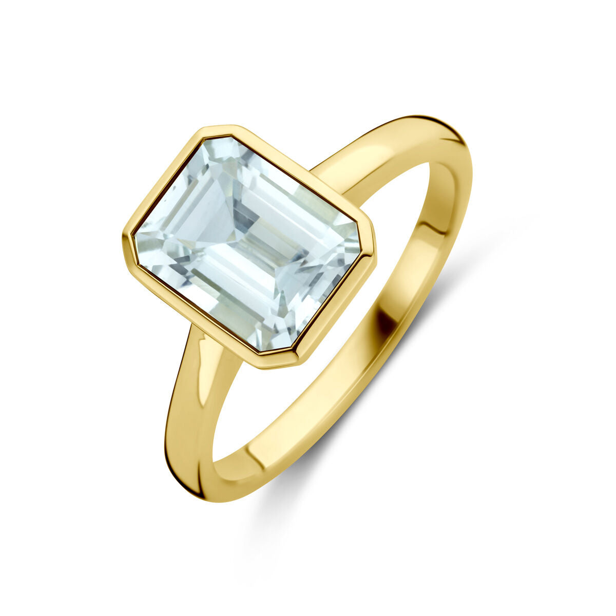 Anillo de oro amarillo de 14 quilates con una piedra de aquamarina rectangular.