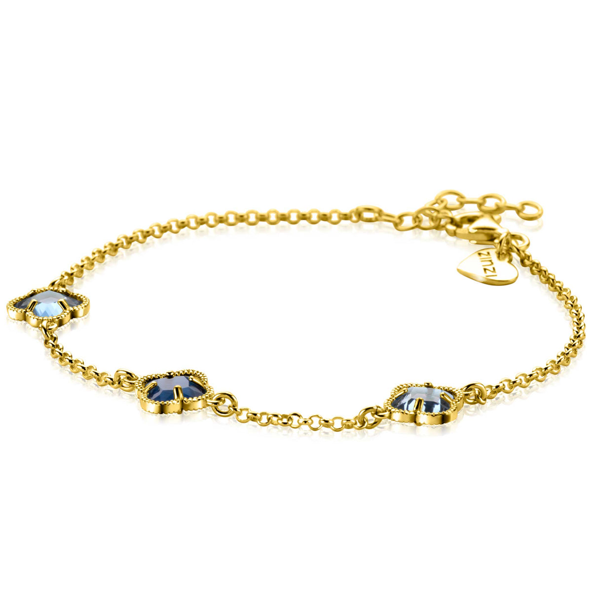 Pulsera de plata con tres flores decorativas y piedras azules.