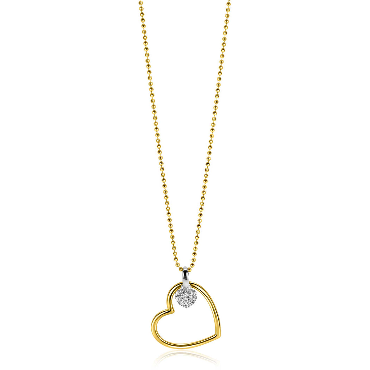 Collar dorado con colgante en forma de corazón y detalle brillante.