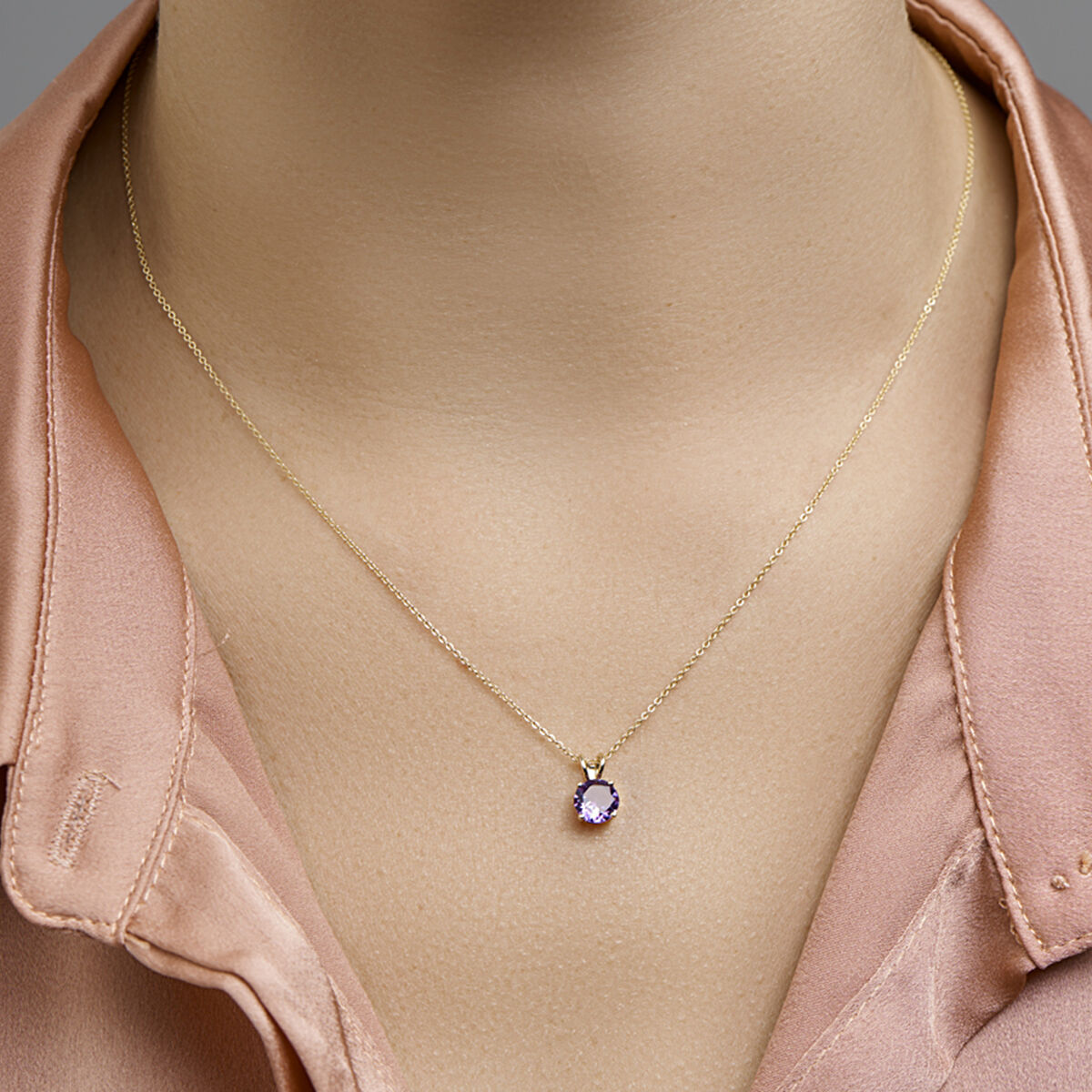 colgante de amatista en oro amarillo de 14K