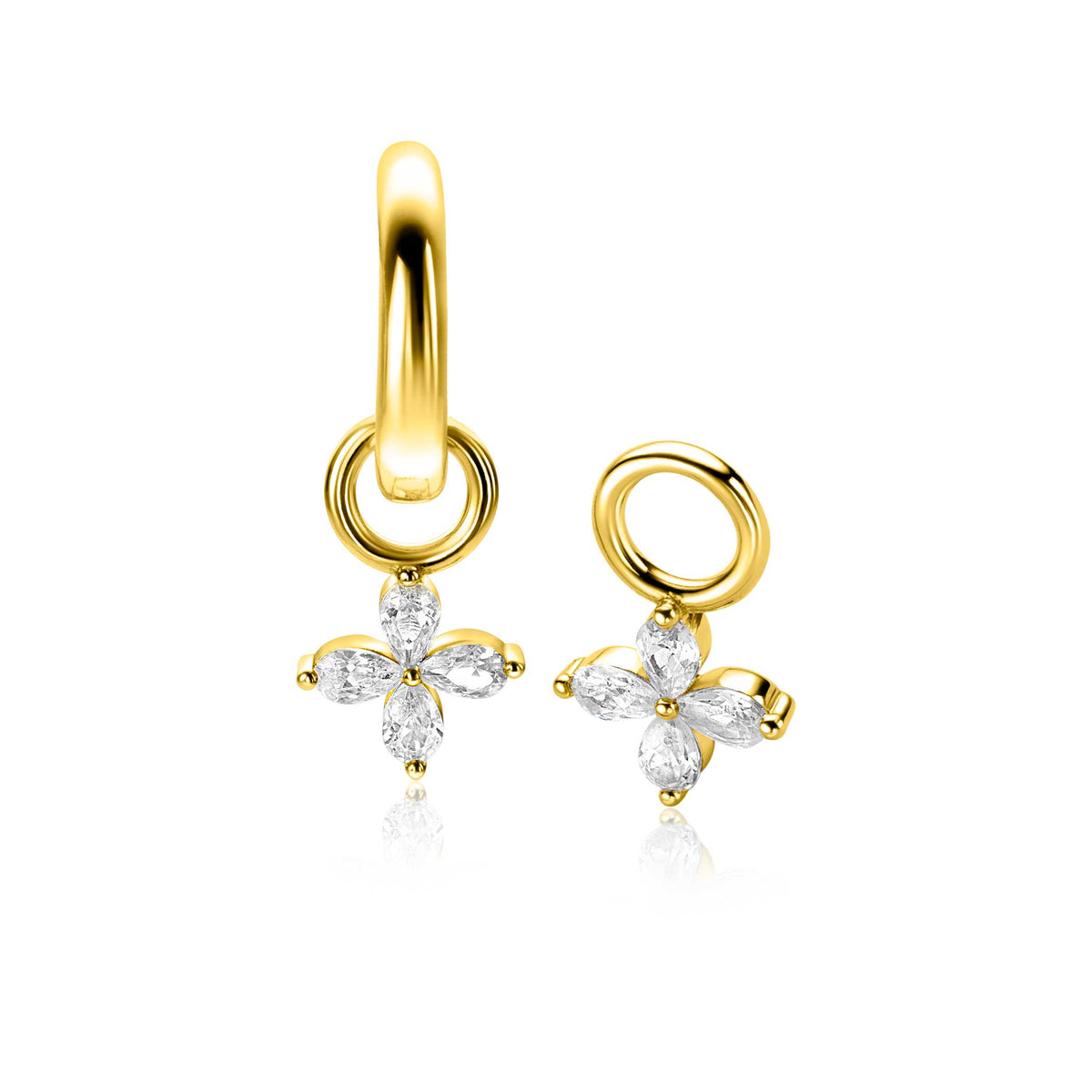 Pendientes de oro con charm en forma de flor, decorados con piedras brillantes.
