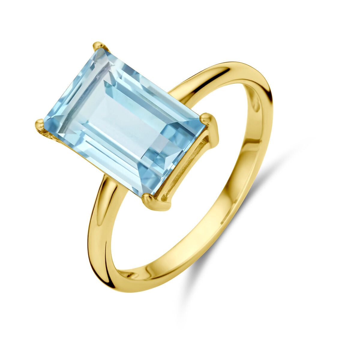 Anillo de topacio azul en oro amarillo de 14 quilates con forma rectangular.