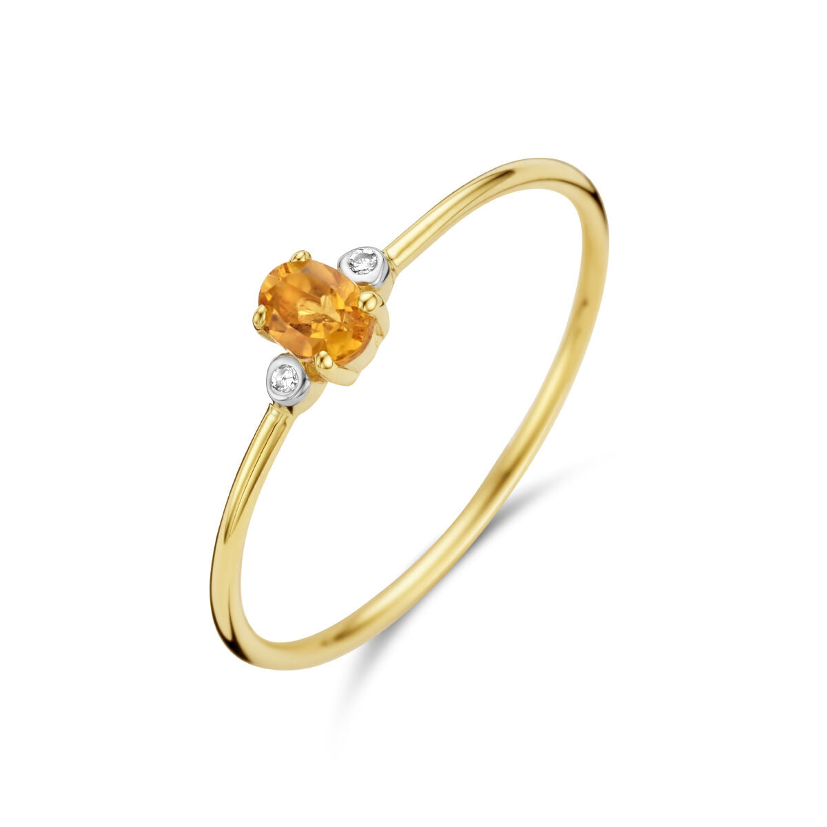 Anillo de trilogía con citrino y diamantes de 0.006ct en oro amarillo de 14K.