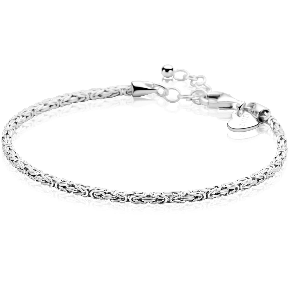 Pulsera esclava de plata con eslabones bizantinos, diseño trenzado y cierre de mosquetón.