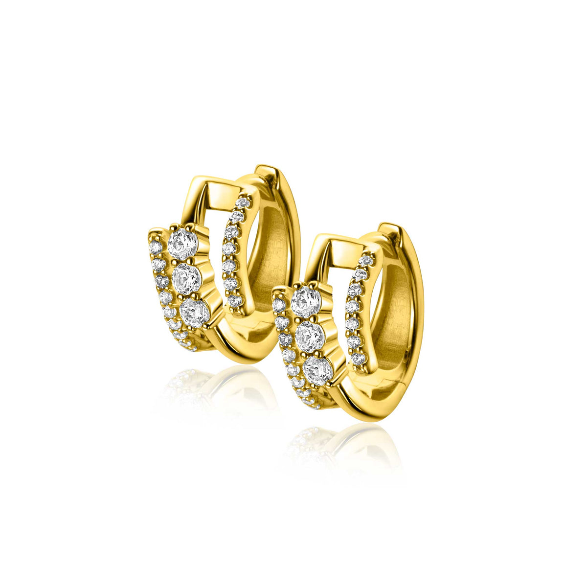 Pendientes de aro dorados con circonitas brillantes en forma de curva.