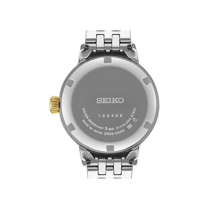 Achteraanzicht van het Seiko Presage dames horloge SRE010J1 van Seiko, met een metalen band, gegraveerde details, waterbestendigheid en een goudkleurige kroon - ideaal voor wie op zoek is naar een elegant en automatisch waterdicht horloge.