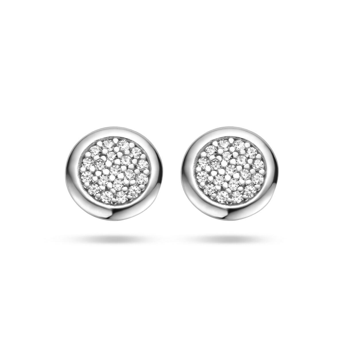 Pendientes de primera puesta de plata rodiada con circonitas brillantes en forma redonda.