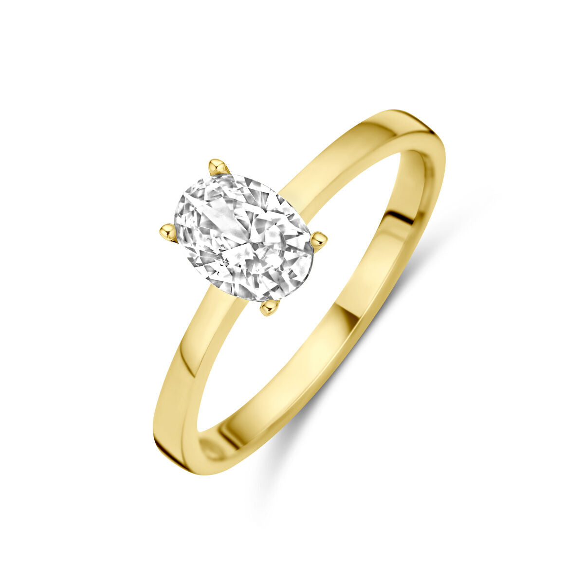 Anillo de oro amarillo de 14K con una piedra de circonia ovalada en el centro.