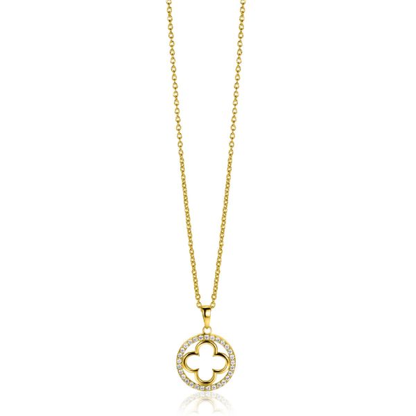Collar dorado con colgante en forma de flor, adornado con piedras brillantes.