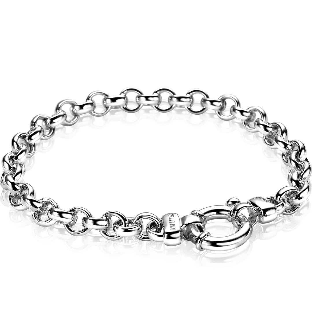 De Zinzi Armband Zilver Zia1729 beschikt over beveiligde cirkelvormige schakels en een ronde sluiting, met een gegraveerd detail op één schakel. Op een witte achtergrond komt de elegante uitstraling van dit zilverkleurige sieraad perfect naar voren.