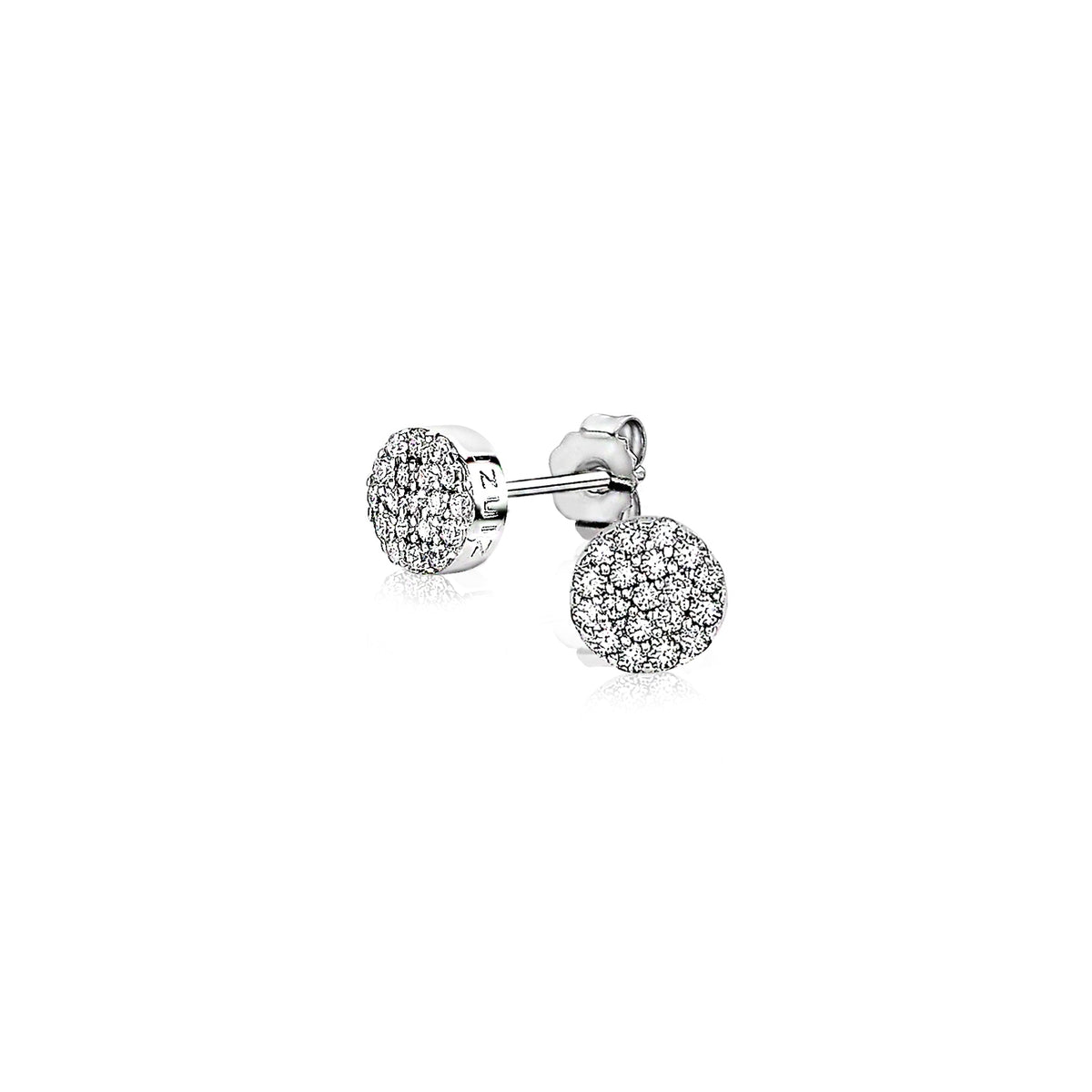 Pendientes de botón plateados con circonitas brillantes en forma de esfera.