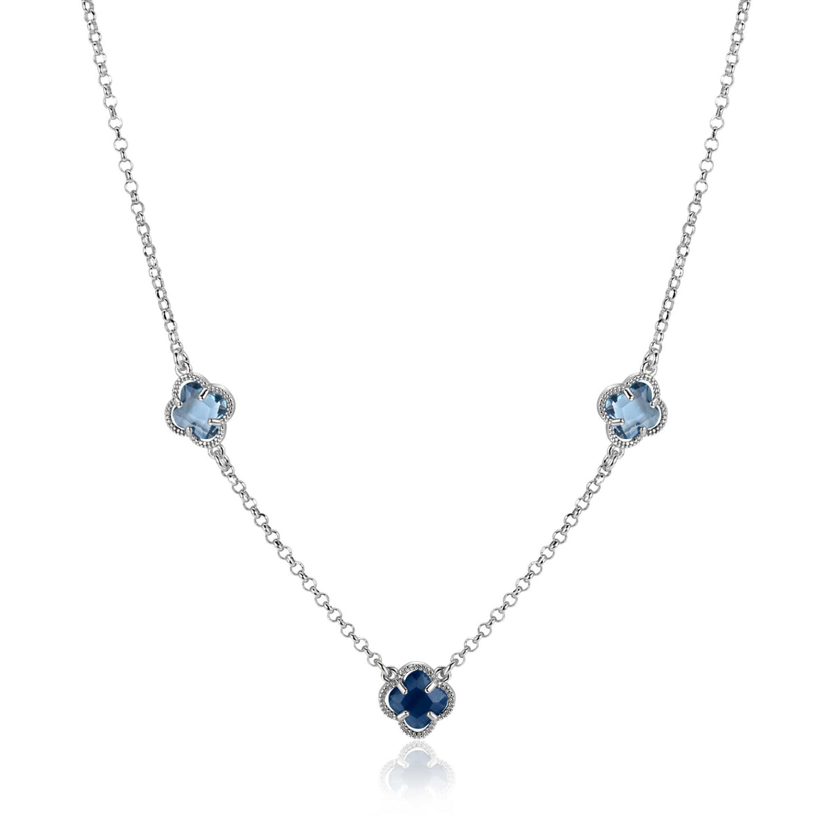 Cadena de plata con tres flores de piedras preciosas azules.