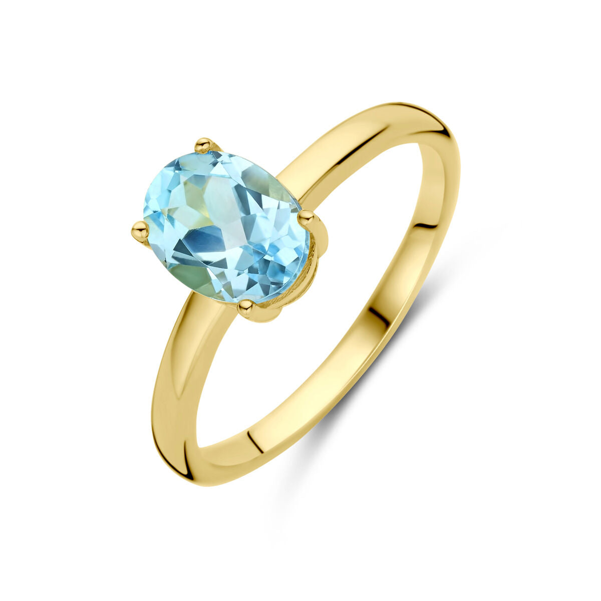 Anillo de oro amarillo de 14K con topacio azul ovalado.