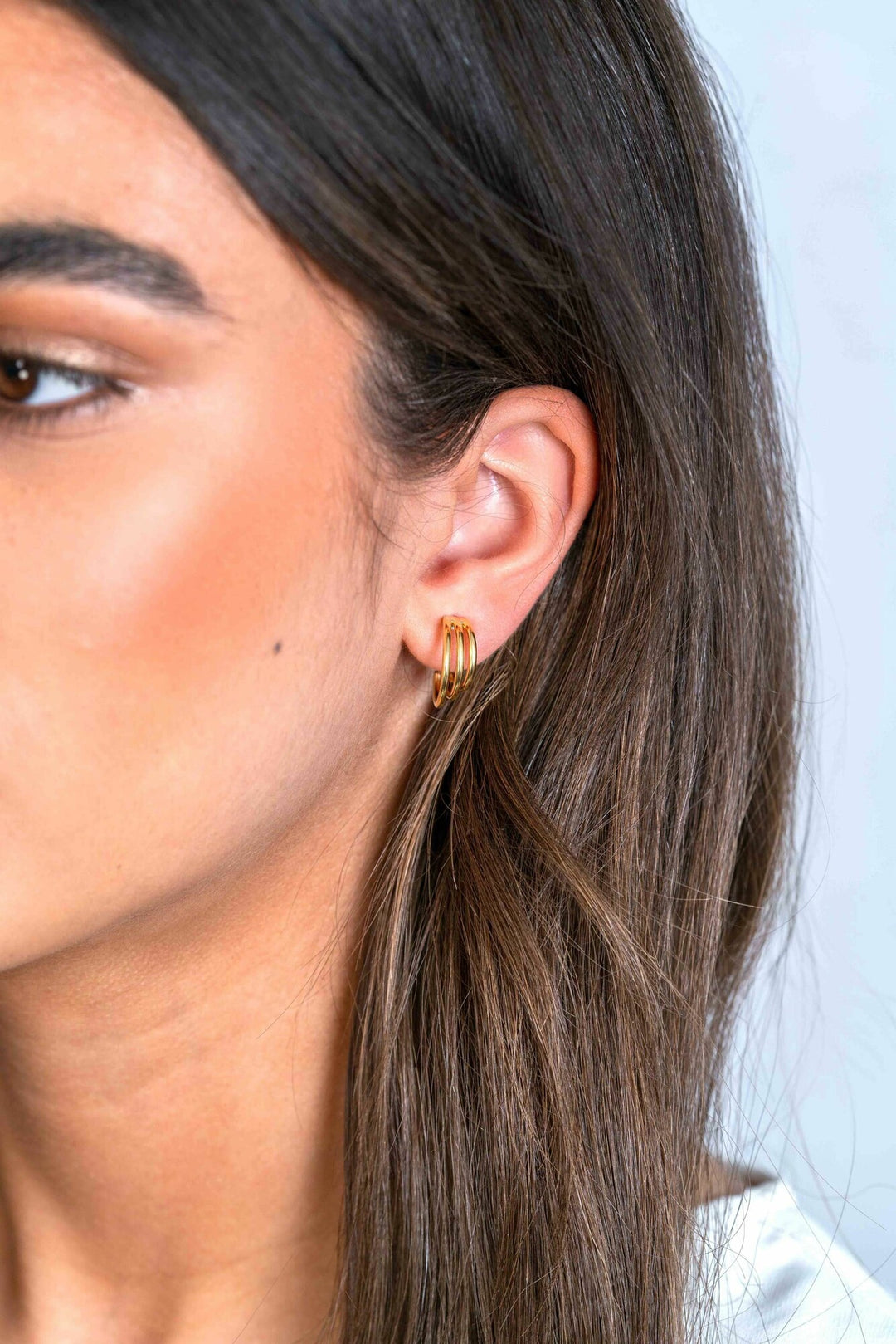 ZINZI gold plated oorstekers drie banen ZIO2294