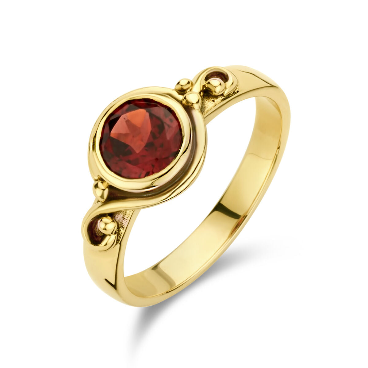 Anillo vintage de granate en oro amarillo de 14K con diseño curvado y detalles esféricos.