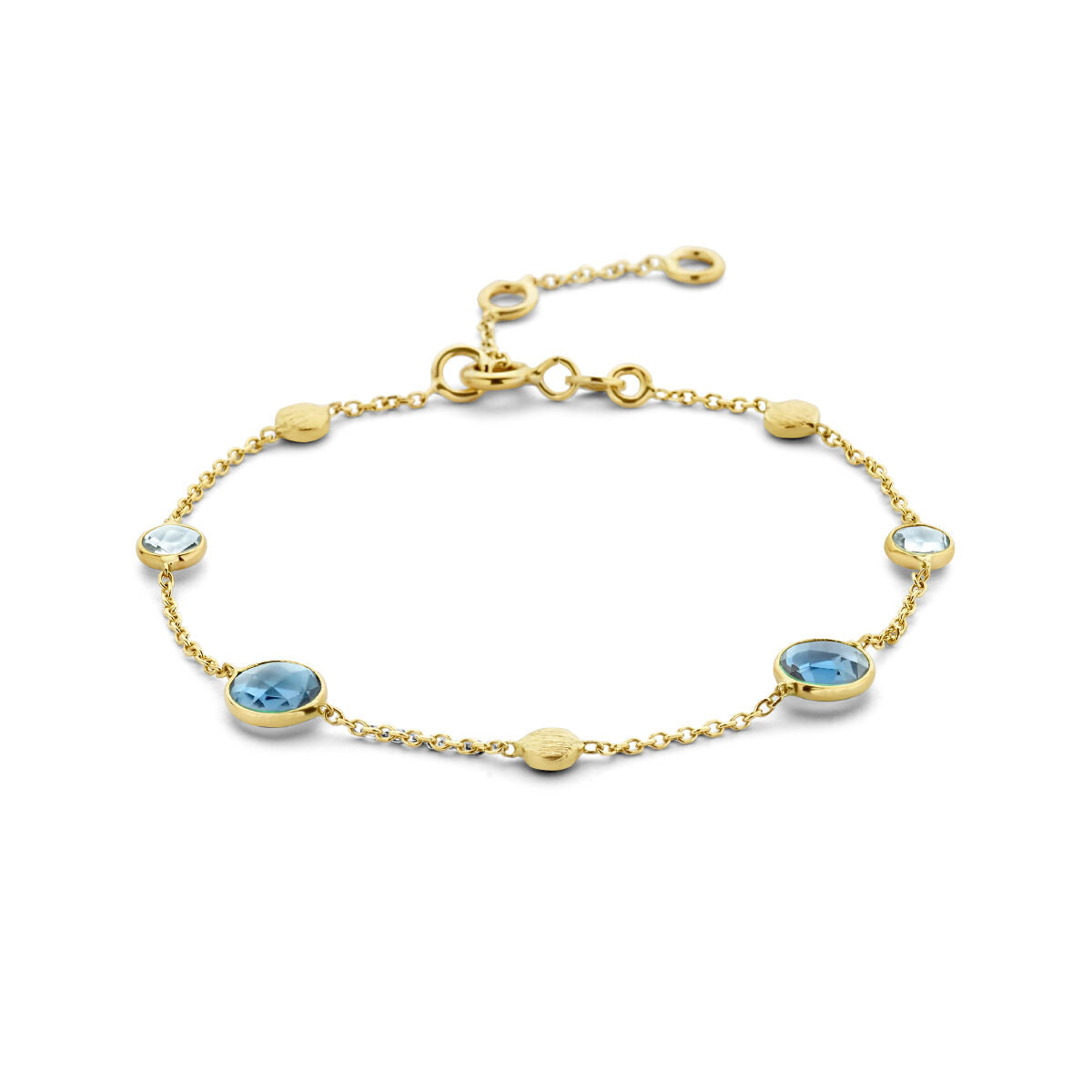 Pulsera dorada de 14K con topacios azul y london blue en forma de círculos.