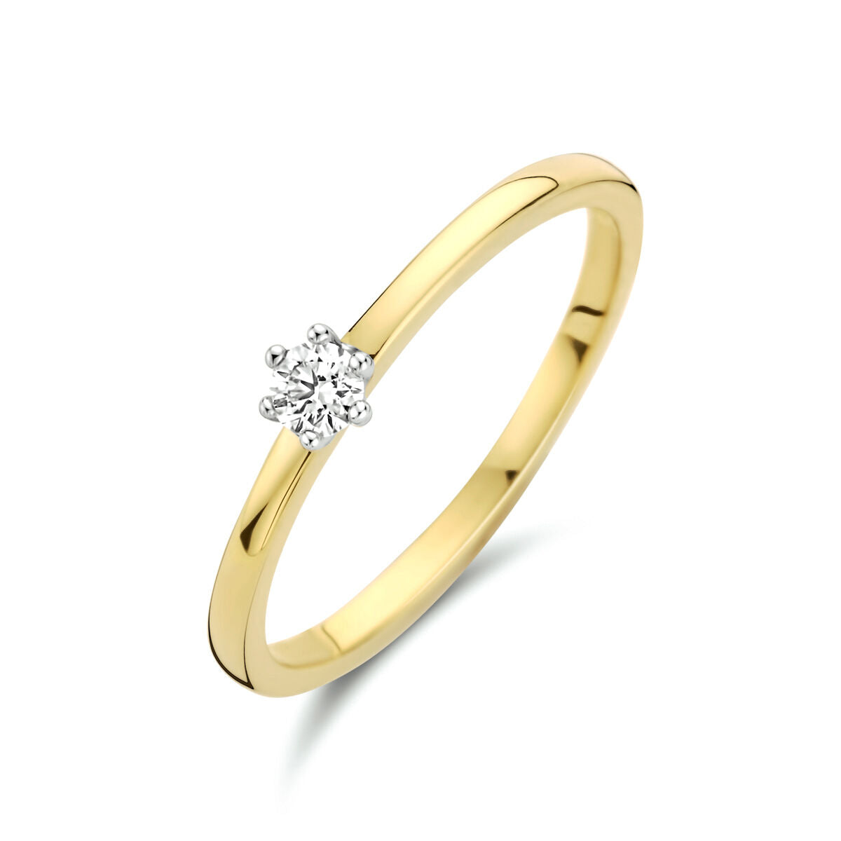 Anillo bicolor de oro amarillo y blanco con diamante de 0.10 ct.
