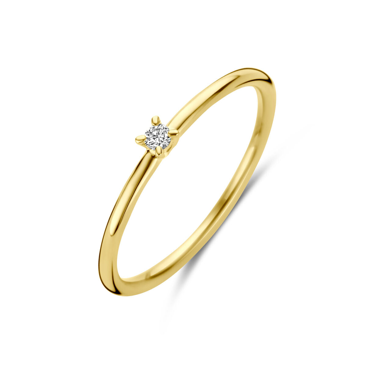 Anillo de oro amarillo de 14K con un diamante de 0.03 ct en engaste de cuatro garras.