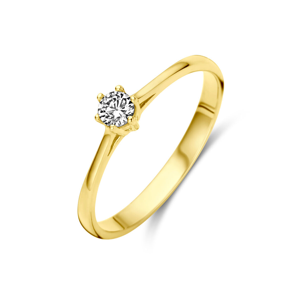 Anillo de oro amarillo de 14K con una piedra de circonia brillante en el centro.