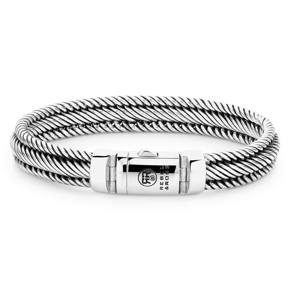 Pulsera de acero inoxidable con diseño trenzado y cierre de seguridad.