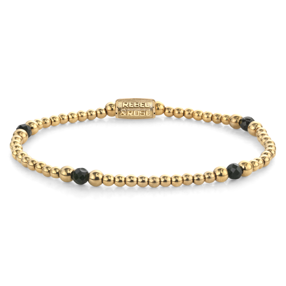 Pulsera de cuentas doradas con detalles en negro y cierre magnético.