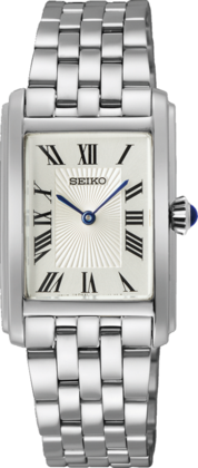 Reloj de dama Seiko con caja rectangular plateada, esfera blanca y números romanos en negro.