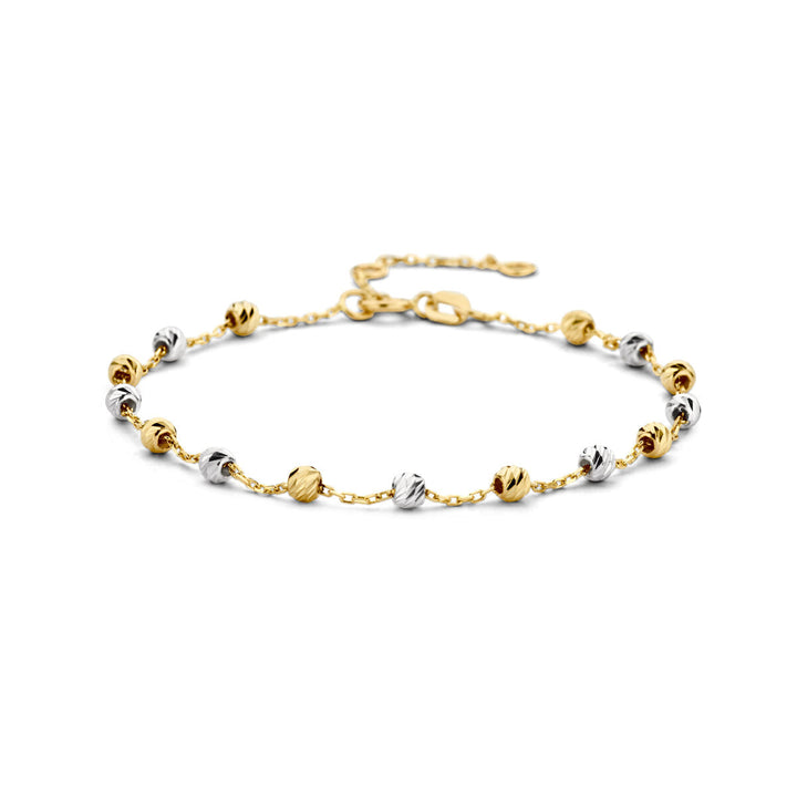 De Van der Kooij Collectie Gouden armband dames bolletjes gediamanteerd 14K bicolor is een verfijnde armband met afwisselend gouden en zilveren kralen aan een delicate ketting - een elegant accessoire voor elke dag met een verstelbare sluiting.