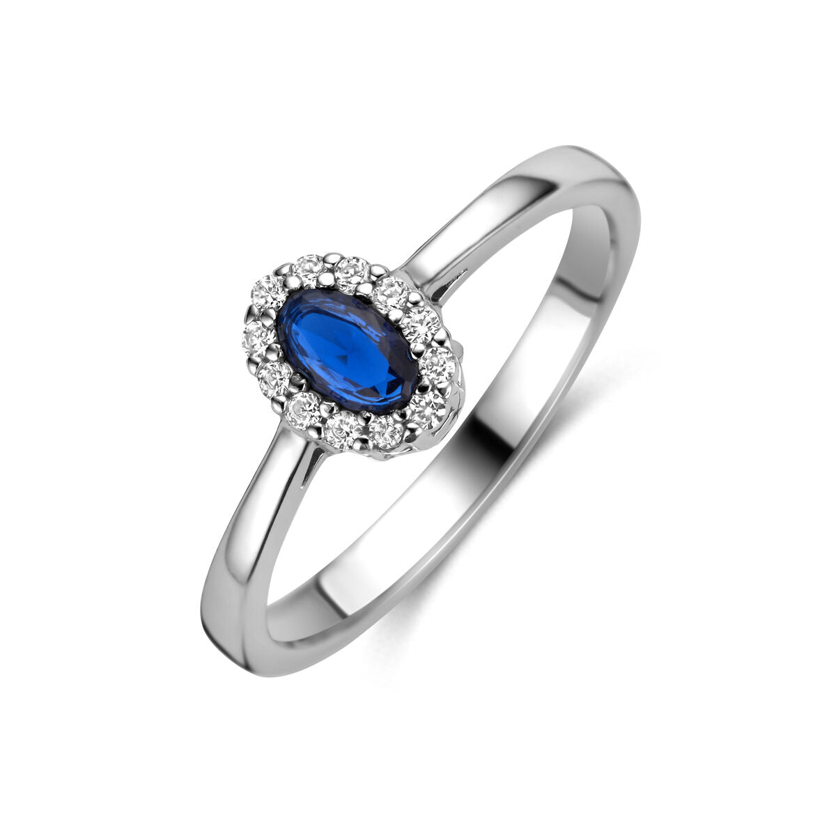 Anillo de plata rodiada para dama con zafiro ovalado y circonitas alrededor.